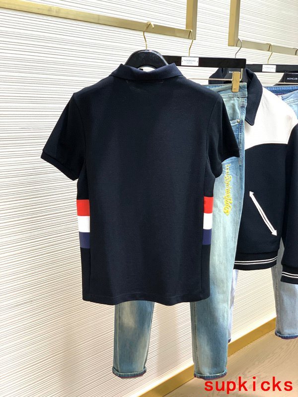 Side profile of Moncler luxury clothing with signature branding