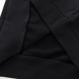 Close-up detail shot of Louis Vuitton luxury clothing with signature branding