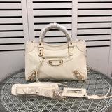 Side profile of modern statement women's handbag – women's luxury accessory
