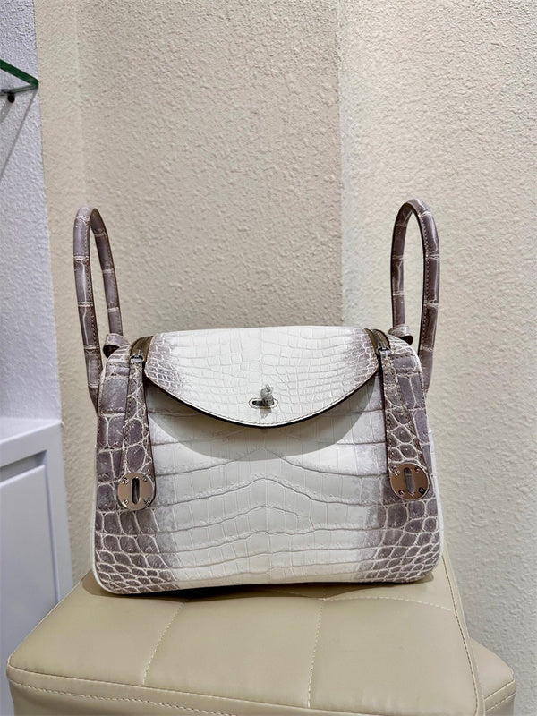  polished carryall bag styled with outfit
