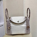  polished carryall bag styled with outfit
