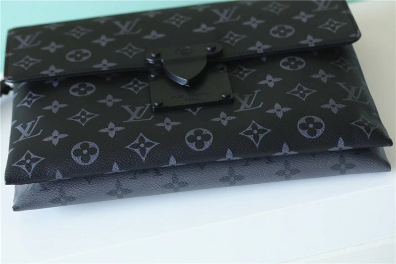  streamlined top-handle bag styled with outfit