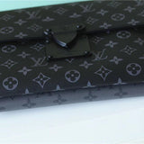  streamlined top-handle bag styled with outfit