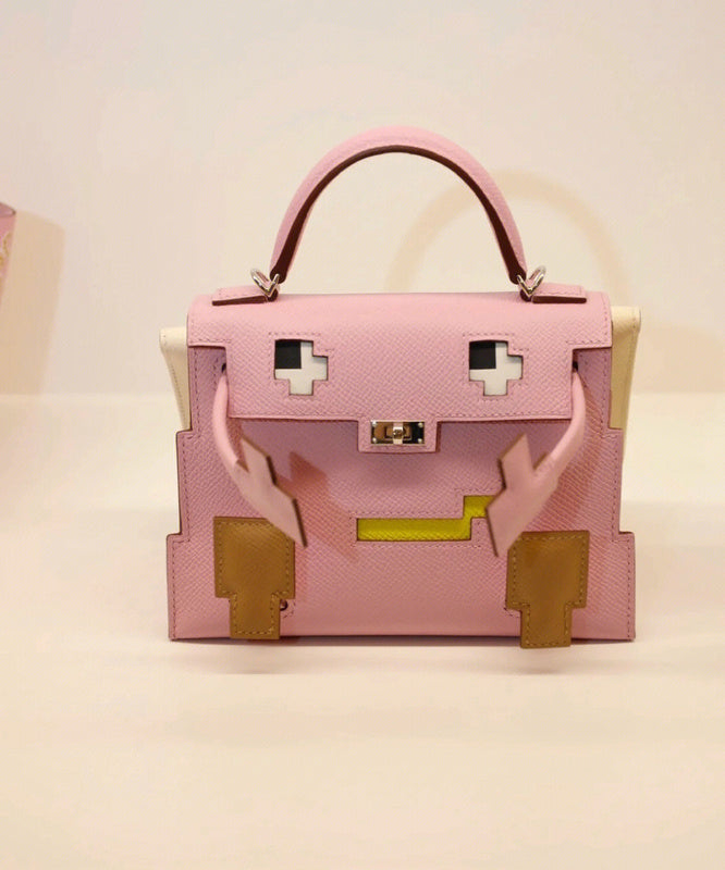  streamlined top-handle bag styled with outfit