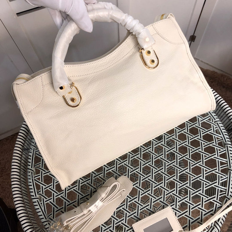 Front view of polished premium women's handbag – women's statement bag