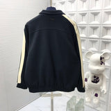 Back view of Louis Vuitton luxury clothing with tailored silhouette