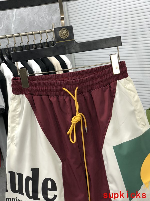 Close-up detail shot of Rhude luxury clothing with streetwear-inspired cut