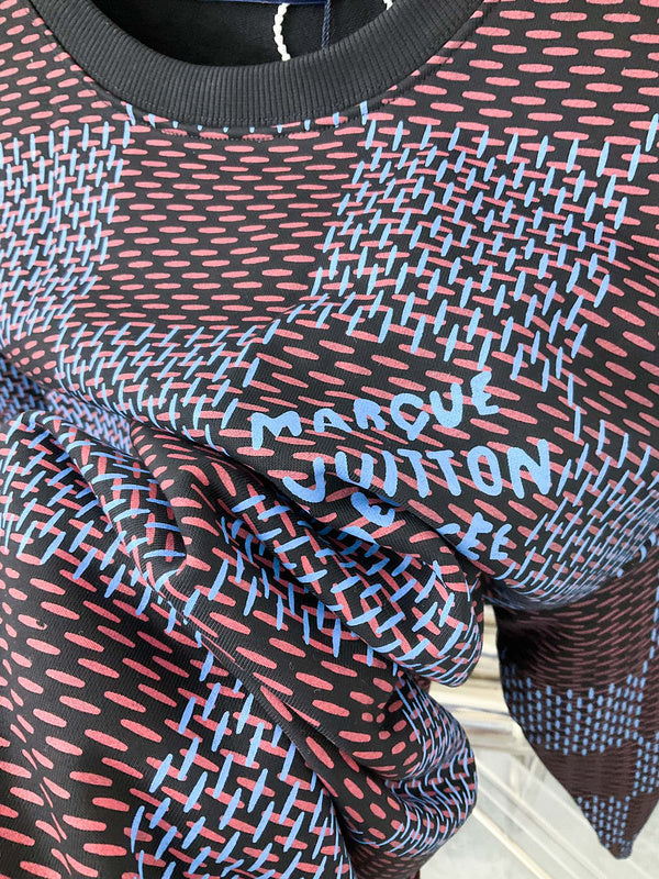 Front view of Louis Vuitton luxury clothing with label-forward styling