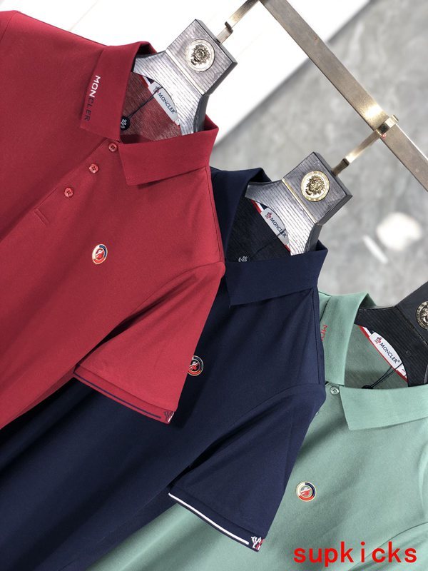 Flat lay presentation of Moncler luxury clothing with relaxed-fit cut