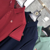 Flat lay presentation of Moncler luxury clothing with relaxed-fit cut