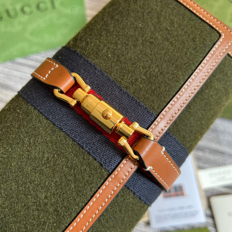 Handle and strap detail of signature polished women's handbag – women's everyday handbag