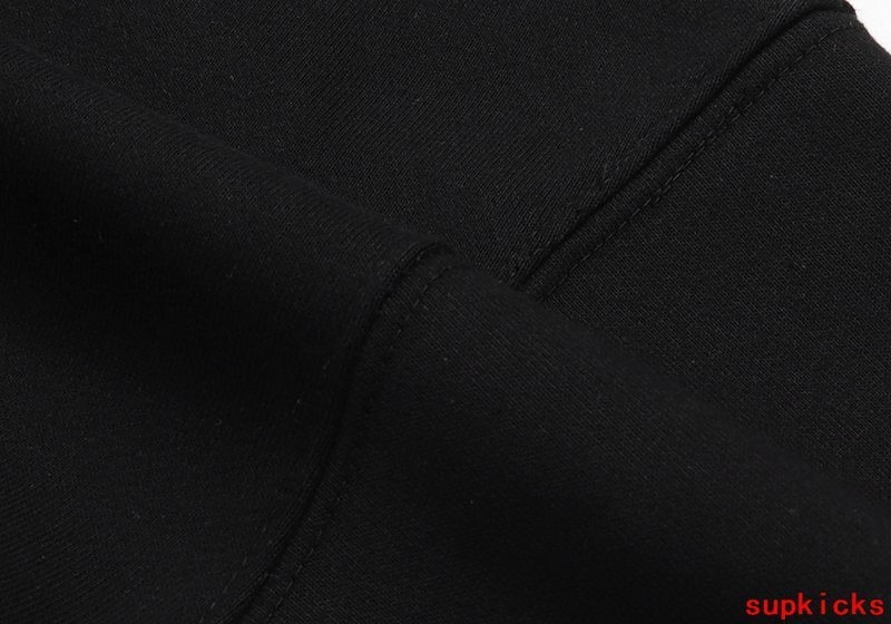Back view of Rhude luxury clothing with streetwear-inspired cut