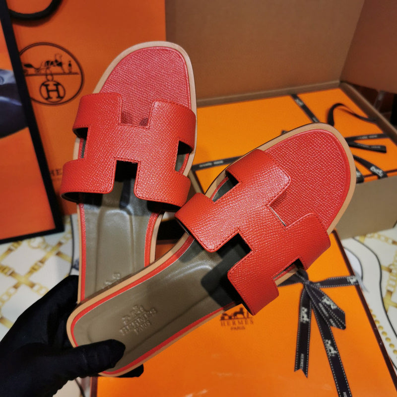 Hermès Red Slide Sandals - Angled View