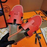 Hermès Red Slide Sandals - Angled View