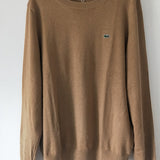 Full styled look of Lacoste luxury clothing with monogram-inspired silhouette