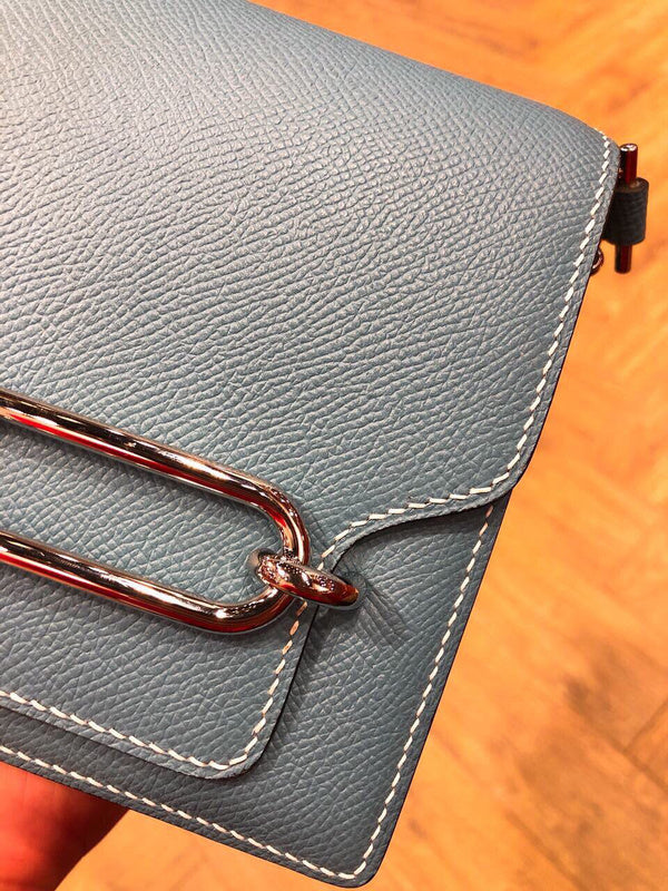 Side view of timeless structured handbag