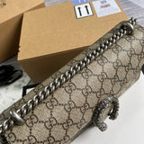 Styled lifestyle shot of classic modern women's handbag – women's luxury handbag