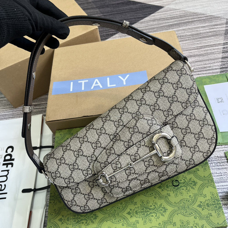Handle and strap detail of elevated everyday-luxe women's handbag – women's luxury accessory