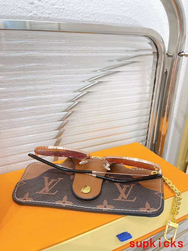 Close-up detail view of Louis Vuitton unisex sunglasses