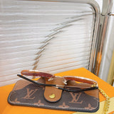 Close-up detail view of Louis Vuitton unisex sunglasses