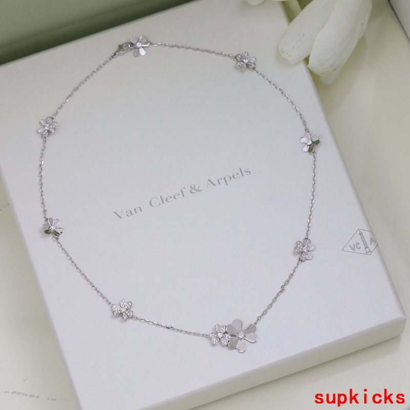 Lifestyle view of Van Cleef & Arpels unisex jewelry piece