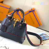 Side profile of statement structured women's handbag – women's statement bag