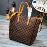 Back view of chic elevated women's handbag – women's statement bag