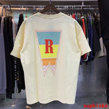Front view of Rhude luxury clothing with tailored silhouette