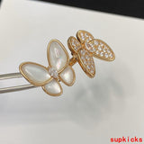 Angled view of Van Cleef & Arpels unisex jewelry piece