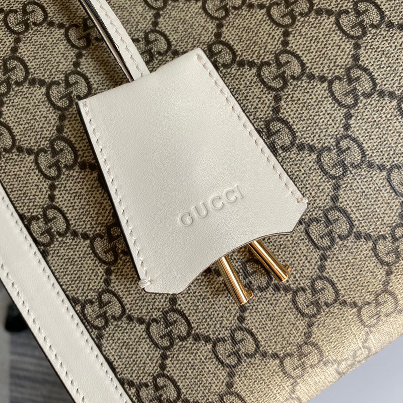 Handle and strap detail of everyday-luxe chic women's handbag – women's designer-style accessory