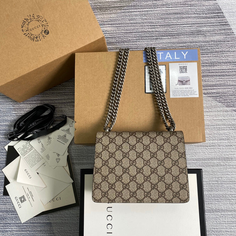Front view of signature polished women's handbag – women's statement bag
