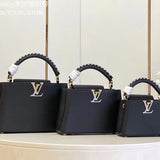 Close-up detail of everyday-luxe signature women's handbag – women's luxury handbag