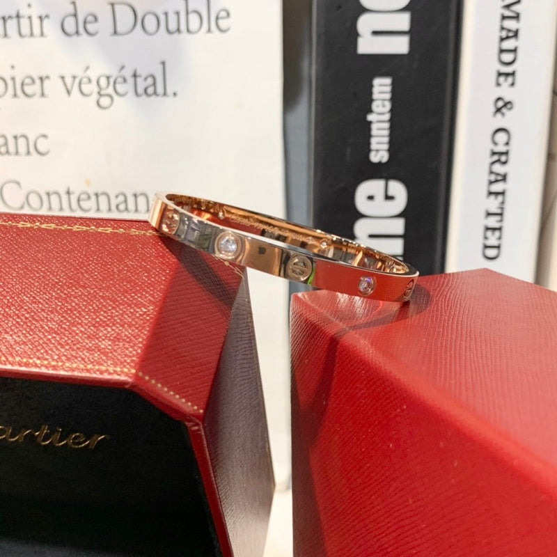 Side view of Cartier unisex jewelry piece
