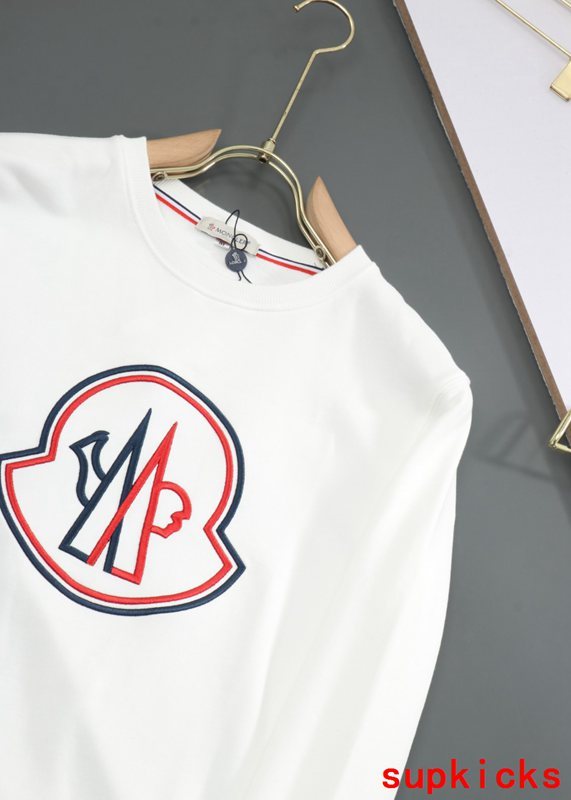 Side profile of Moncler luxury clothing with everyday silhouette