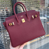 Side view of statement structured handbag