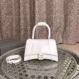 Close-up detail of premium refined women's handbag – women's statement bag