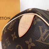 Handle and strap detail of signature polished women's handbag – women's luxury handbag