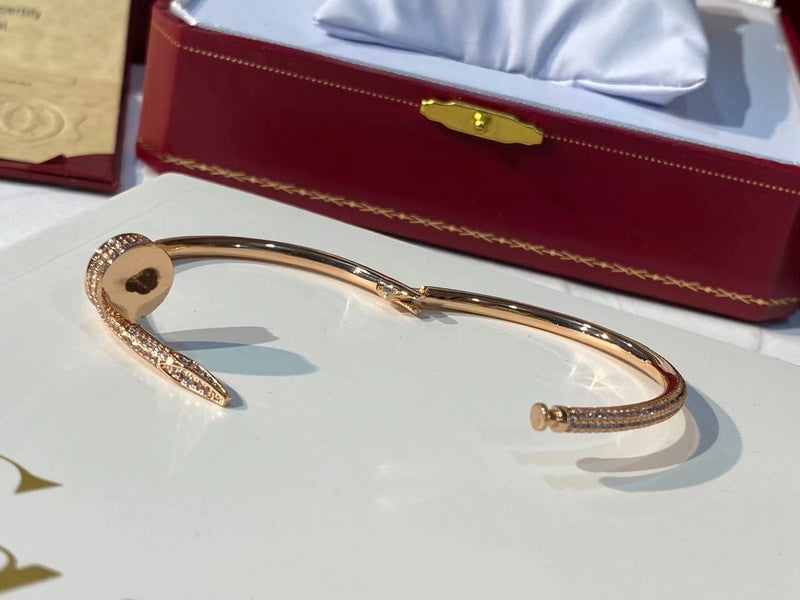 Side view of Cartier unisex jewelry piece