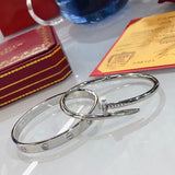 Front view of Cartier unisex jewelry piece