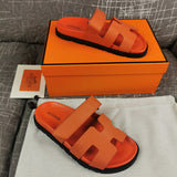 Hermes sandals Style 128 - close-up of statement logo accent