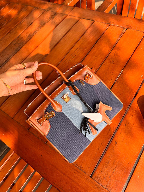 Close-up detail of sculpted bag design