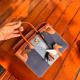 Close-up detail of sculpted bag design