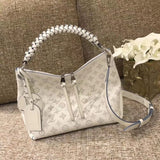 Front view of classic refined women's handbag – women's luxury handbag