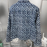 Close-up detail shot of Louis Vuitton luxury clothing with everyday silhouette