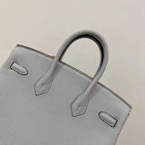  structured shoulder bag styled with outfit
