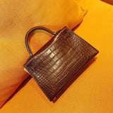 Side view of modern structured handbag