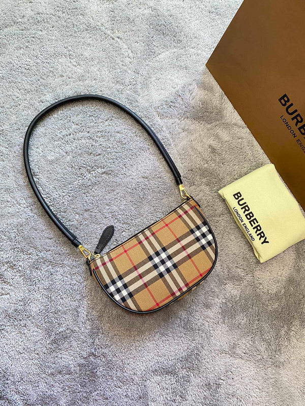 Ziva's Charm handbag – side angle view (one versatile size)