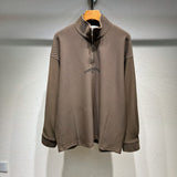 Back view of Louis Vuitton luxury clothing with monogram-inspired silhouette