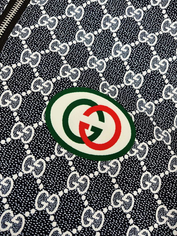 Close-up detail shot of Gucci luxury clothing with logo-detail design