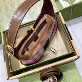 Styled lifestyle shot of sleek signature women's handbag – women's premium purse
